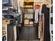 Walk-in closet featuring clothing racks, shelves, dark wood drawers, and organized storage at 3777 Peachtree Ne Rd # 1227, Brookhaven, GA 30319