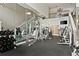 Community gym with extensive workout equipment, weights, mirrors, and a second-story view at 3777 Peachtree Ne Rd # 1227, Brookhaven, GA 30319