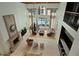 Open-concept lobby with high ceilings, a fireplace, multiple seating areas, and pool views at 3777 Peachtree Ne Rd # 1227, Brookhaven, GA 30319