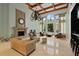 Lobby with fireplace, high ceilings, chandelier, large windows with pool view, and seating areas at 3777 Peachtree Ne Rd # 1227, Brookhaven, GA 30319