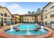 Resort-style pool area with fountains, lounge chairs, and well-maintained landscaping for relaxation at 3777 Peachtree Ne Rd # 1227, Brookhaven, GA 30319