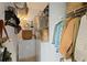 Functional utility room with washer, dryer, storage shelves and space for household needs at 3777 Peachtree Ne Rd # 1227, Brookhaven, GA 30319