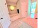 This bathroom includes a tub, sink, and tiled floors at 4086 Rex Road, Rex, GA 30273