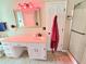 Bathroom featuring a vanity with cabinets, drawers, a mirror, and a shower at 4086 Rex Road, Rex, GA 30273