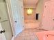 This bathroom includes a tub, sink, and tiled floors at 4086 Rex Road, Rex, GA 30273