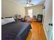Guest bedroom offers hardwood floors, good natural light, and closet with door at 4086 Rex Road, Rex, GA 30273
