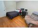 Guest bedroom offers hardwood floors and ample space at 4086 Rex Road, Rex, GA 30273