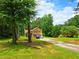 Lovely two-story home featuring a well-maintained lawn and long private driveway at 4086 Rex Road, Rex, GA 30273