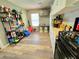 Laundry room featuring modern wood-look flooring, storage and ample counter space at 4086 Rex Road, Rex, GA 30273