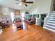 Living room with vaulted ceilings, hardwood floors, and comfortable seating at 4086 Rex Road, Rex, GA 30273