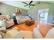 Comfortable living room featuring hardwood floors, neutral decor, and open layout at 4086 Rex Road, Rex, GA 30273