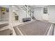 Partially finished basement with tile flooring, carpet, and staircase adds potential living space to the home at 1315 Merry Ne Ln, Atlanta, GA 30329