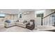 Finished basement with seating area, plush carpet, and natural light offers a versatile living space at 1315 Merry Ne Ln, Atlanta, GA 30329