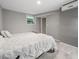 Minimalist bedroom featuring a comfortable bed with crisp white linens at 1315 Merry Ne Ln, Atlanta, GA 30329