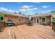 Spacious wooden deck with an outdoor grill and comfortable seating at 1315 Merry Ne Ln, Atlanta, GA 30329