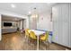 Open-concept dining area with a built-in bench, seamlessly connected to the living space at 1315 Merry Ne Ln, Atlanta, GA 30329