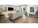 Spacious living room featuring hardwood floors, custom built-ins, and natural light at 1315 Merry Ne Ln, Atlanta, GA 30329