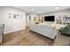 Spacious living room featuring hardwood floors, custom built-ins, and neutral wall colors at 1315 Merry Ne Ln, Atlanta, GA 30329