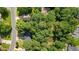 Large lot boasts mature trees and ample privacy, marked with a red outline of the property at 3366 English Oaks Nw Dr, Kennesaw, GA 30144