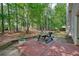 Outdoor patio featuring a picnic table, offering an ideal space for gatherings and outdoor enjoyment at 3366 English Oaks Nw Dr, Kennesaw, GA 30144