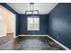 Dining room with stylish light fixture and slate tile flooring at 3366 English Oaks Nw Dr, Kennesaw, GA 30144
