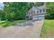 Spacious two-story home with a long driveway and a mix of brick and siding exterior at 3366 English Oaks Nw Dr, Kennesaw, GA 30144