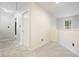 Upstairs hallway with neutral carpet, and paint, access to rooms, and lots of natural light at 3366 English Oaks Nw Dr, Kennesaw, GA 30144