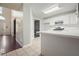 Bright kitchen with white cabinets and stainless steel appliances at 3366 English Oaks Nw Dr, Kennesaw, GA 30144