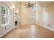Expansive living room features tall ceilings, large windows, fireplace, and natural light at 3366 English Oaks Nw Dr, Kennesaw, GA 30144