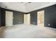 Large main bedroom with neutral carpet, paint, and tray ceiling and access to bathrooms at 3366 English Oaks Nw Dr, Kennesaw, GA 30144