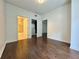Bedroom with hardwood floors and a door leading to a bathroom at 195 14Th Ne St # 303, Atlanta, GA 30309