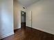 Bedroom with hardwood floors and a door leading to another room at 195 14Th Ne St # 303, Atlanta, GA 30309