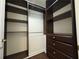 Spacious walk-in closet with custom shelving and drawers for organized storage at 195 14Th Ne St # 303, Atlanta, GA 30309