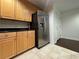 Updated kitchen featuring stainless steel refrigerator and light wood cabinetry at 195 14Th Ne St # 303, Atlanta, GA 30309