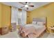 Cozy bedroom with natural light, soft carpet, and a comfortable bed at 202 Roseman Way, Woodstock, GA 30188