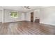 This living room features fresh paint, wood flooring, and ample natural light at 2067 Skyhawk Ln, Acworth, GA 30102