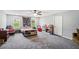 Bright bedroom with carpet, ample natural light, and a neutral color scheme at 2118 Braswell Ln, Loganville, GA 30052
