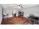 Inviting dining area with hardwood floors, ceiling fan, and access to the living room at 2118 Braswell Ln, Loganville, GA 30052