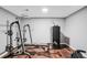 Basement gym area with weightlifting equipment and rubber flooring at 2118 Braswell Ln, Loganville, GA 30052