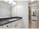 Bathroom with black granite countertop and updated fixtures at 2335 Corbett Ct, Powder Springs, GA 30127