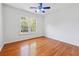 Bedroom with hardwood floors and natural light at 2335 Corbett Ct, Powder Springs, GA 30127