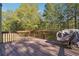 Spacious outdoor deck featuring wood flooring and railing, perfect for entertaining or relaxation at 2335 Corbett Ct, Powder Springs, GA 30127