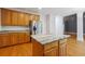 Bright kitchen features stainless steel appliances, hardwood floors, and granite countertops at 2335 Corbett Ct, Powder Springs, GA 30127