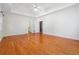 Spacious main bedroom with hardwood floors, a ceiling fan, and plenty of light at 2335 Corbett Ct, Powder Springs, GA 30127
