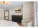 Cozy main bedroom with a large bed, dark dresser, television, and lots of natural light at 2377 Heritage Park Nw Cir # 16, Kennesaw, GA 30144
