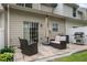 Patio area with a BBQ grill, outdoor seating and a sliding door into the home at 2377 Heritage Park Nw Cir # 16, Kennesaw, GA 30144