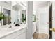 Bathroom featuring double sinks, ample counter space, and stylish fixtures at 3725 Downing Dr, Cumming, GA 30040