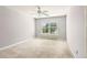 A large bedroom with carpet and natural light at 3725 Downing Dr, Cumming, GA 30040
