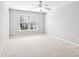 Spacious bedroom with carpet flooring and ample natural light at 3725 Downing Dr, Cumming, GA 30040