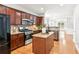 Modern kitchen features stone countertops and stainless steel appliances at 3725 Downing Dr, Cumming, GA 30040